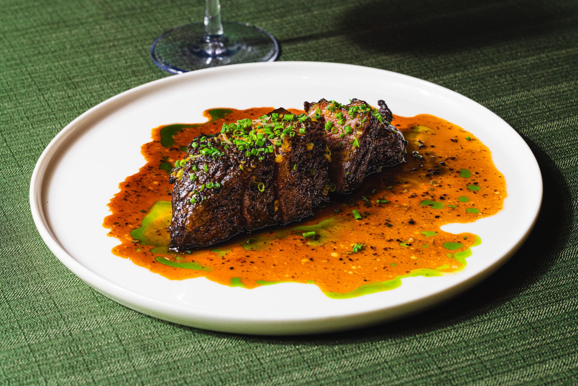 Close-up of caramelised beef short rib in spiced jus at The Margin