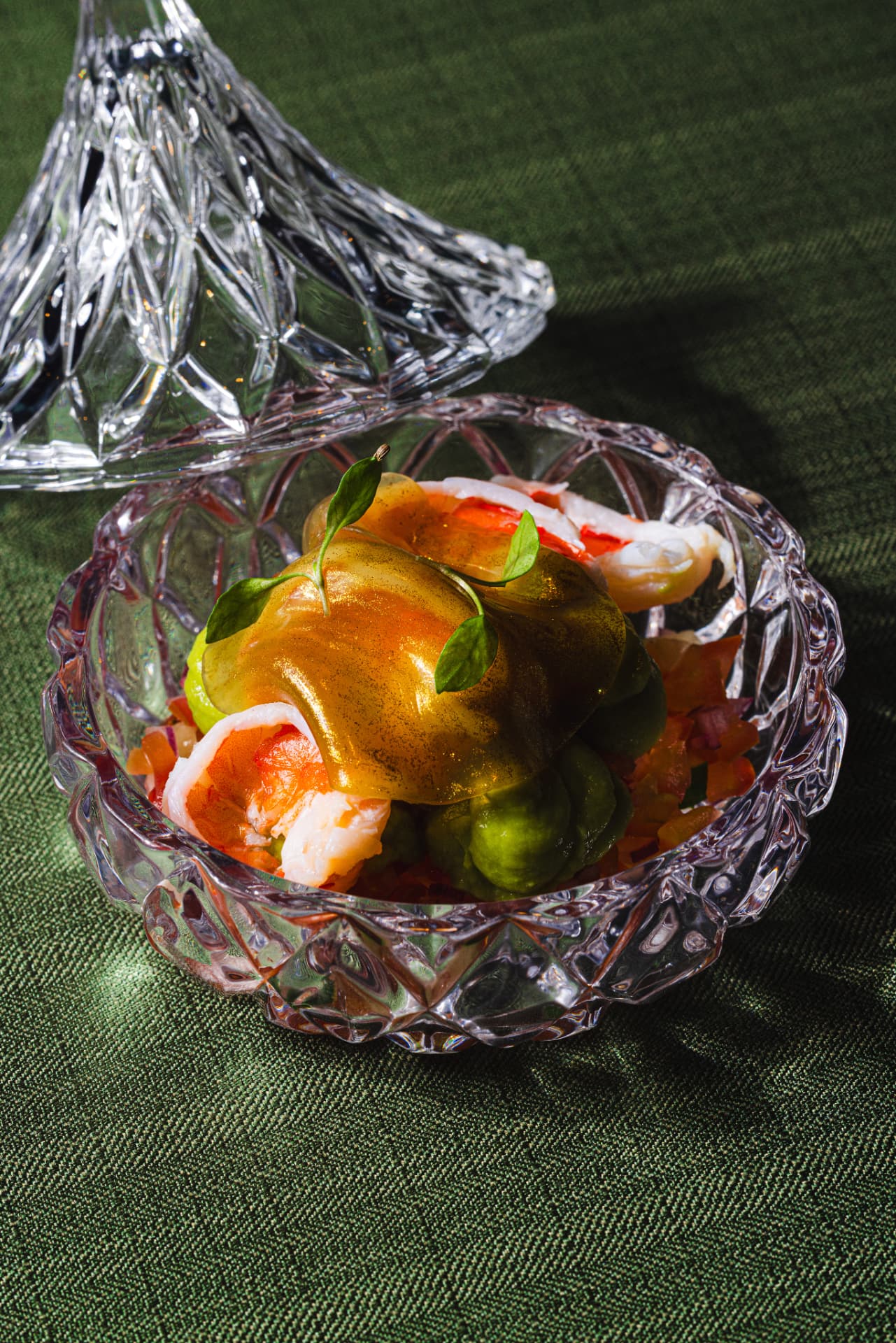 Prawn, avocado and tomato consommé jelly in crystal at The Margin
