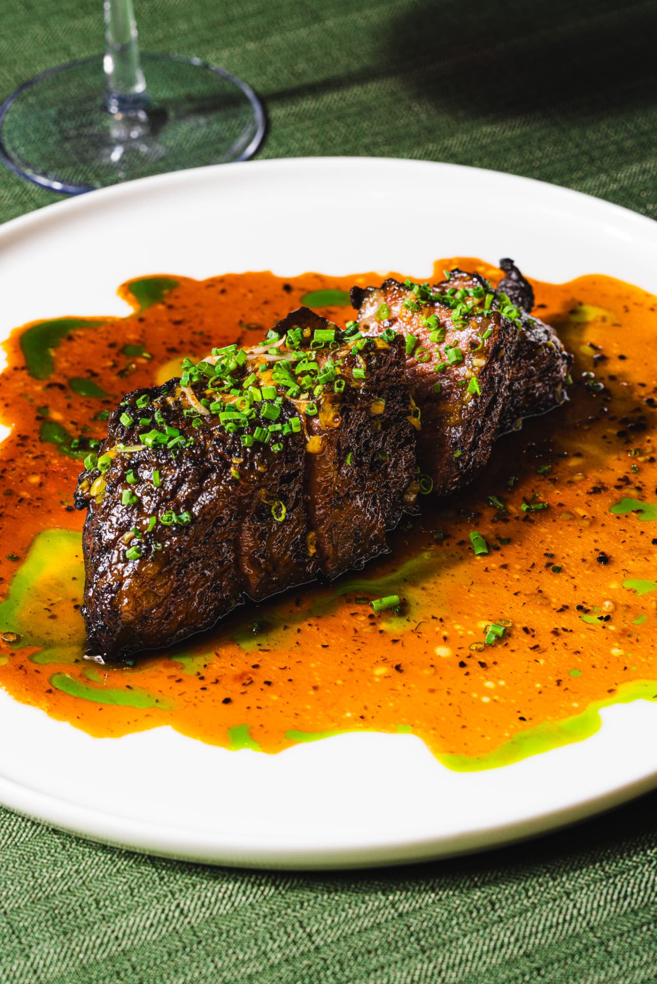 Sliced dry-aged beef short rib glazed in chilli jus at The Margin