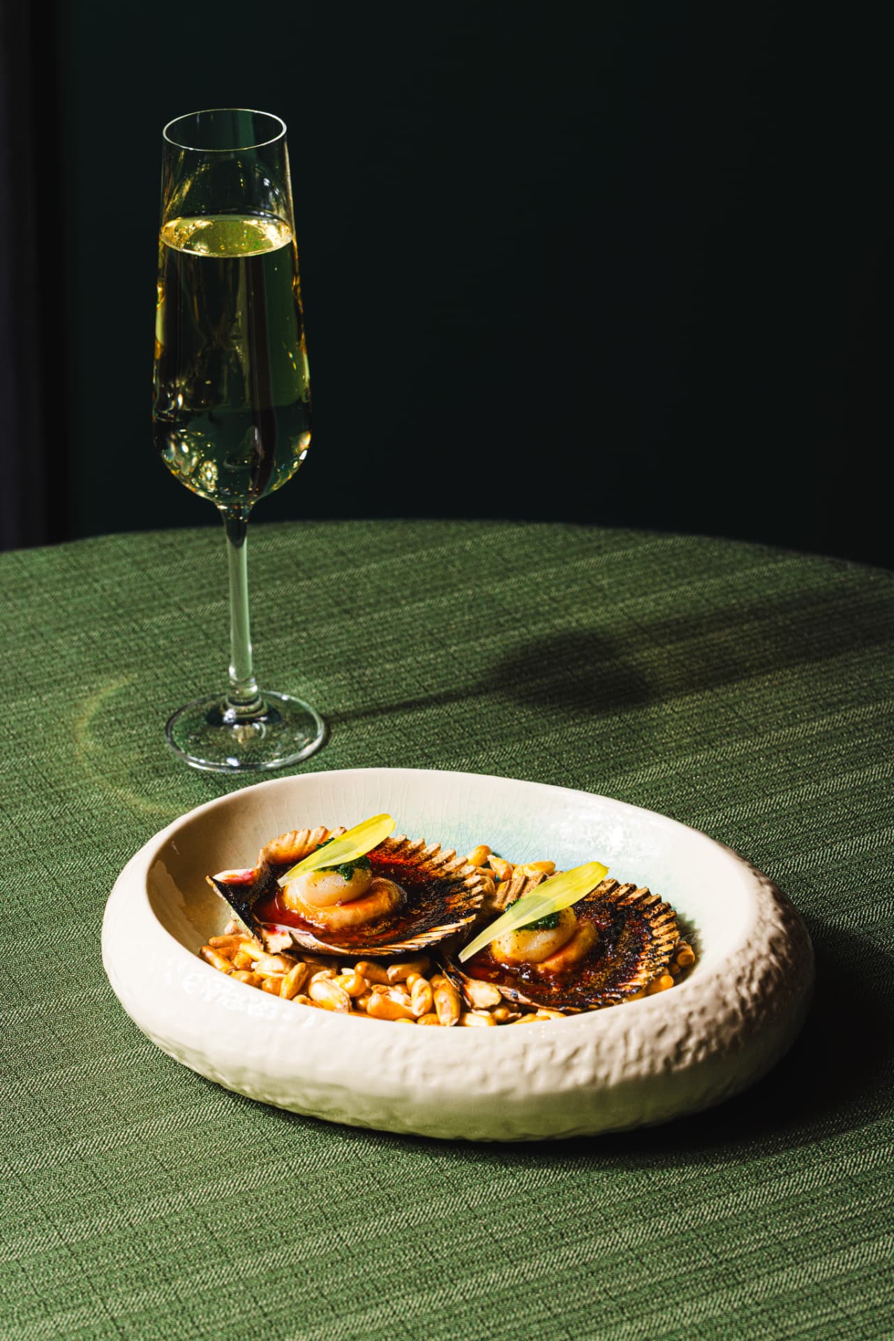 Grilled scallops on the half shell with charred corn at The Margin